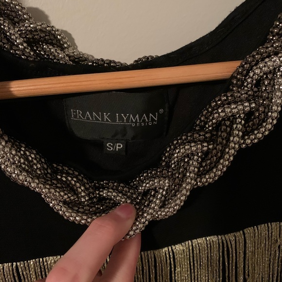 Tank top with gold and shiny black frange. Metal golden collar. - Picture 2 of 4